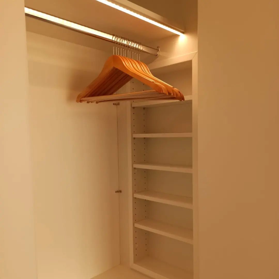 Small wardrobe with rounded corner