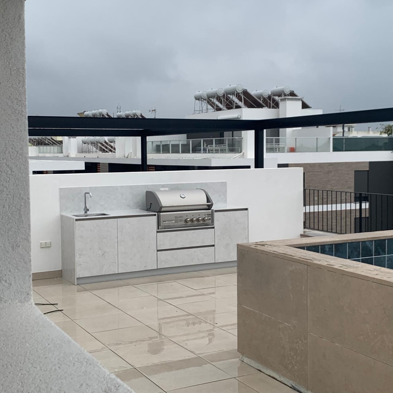 Outdoor Kitchen with Stone Facades